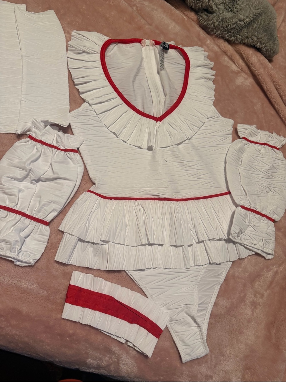 Forplay White One-Piece with Red Trim and Ruffle Detail